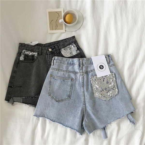 Pantaloni scurți de damă cu un element - paiete în două culori