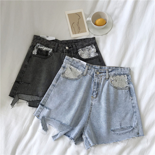 Pantaloni scurți de damă cu un element - paiete în două culori