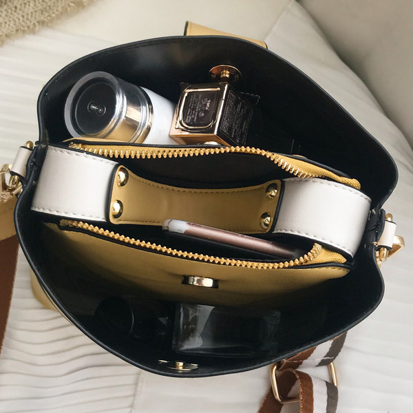 Fém rögzítős női táskák hosszú és rövid füllel