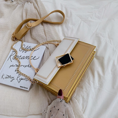 Geanta de dama eleganta cu manere metalice in patru culori