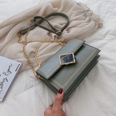 Geanta de dama eleganta cu manere metalice in patru culori