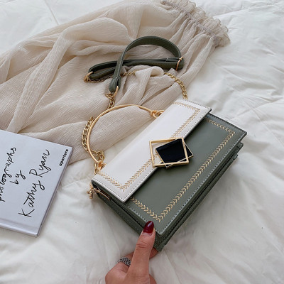 Geanta de dama eleganta cu manere metalice in patru culori