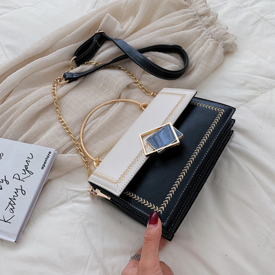 Geanta de dama eleganta cu manere metalice in patru culori