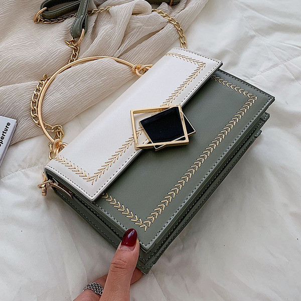 Geanta de dama eleganta cu manere metalice in patru culori