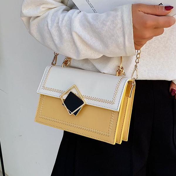 Geanta de dama eleganta cu manere metalice in patru culori