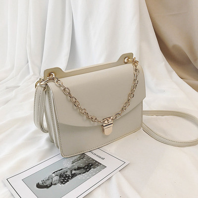 Geanta de dama moderna cu maner lung si metalic