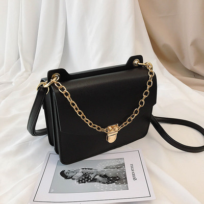 Geanta de dama moderna cu maner lung si metalic