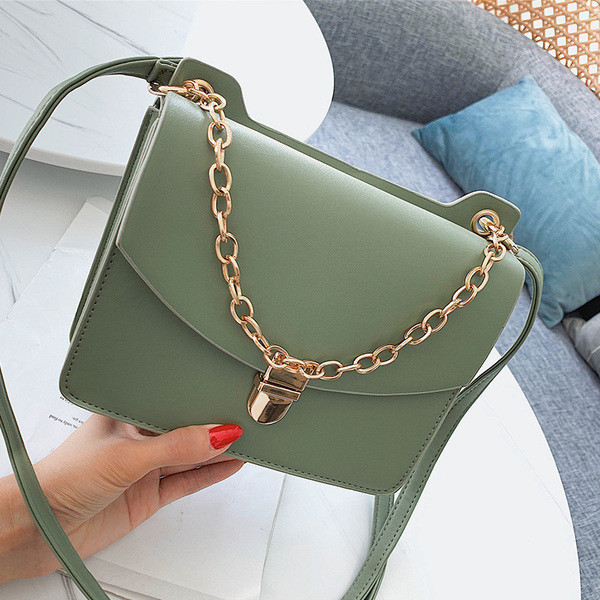 Geanta de dama moderna cu maner lung si metalic