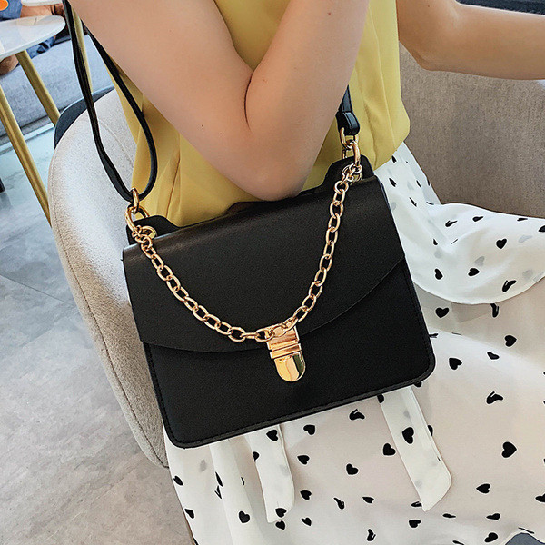 Geanta de dama moderna cu maner lung si metalic