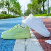 Γυναικεία πάνινα παπούτσια  με κορδόνια  σε λευκό και πράσινο χρώμα