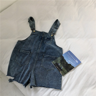 Salopeta de dama din denim cu buzunare inchise la culoare