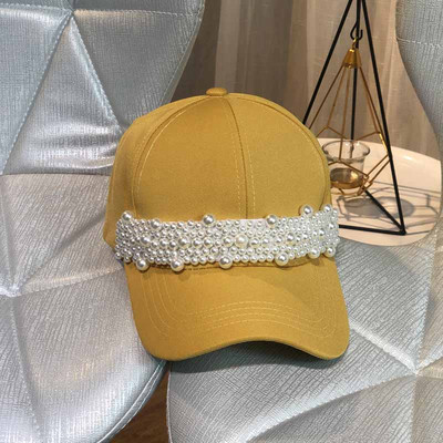 Modern női sapka napellenzővel és gyöngyökkel több színben