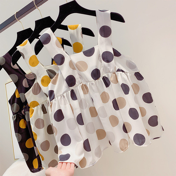 Pöttyös, pántos női felső