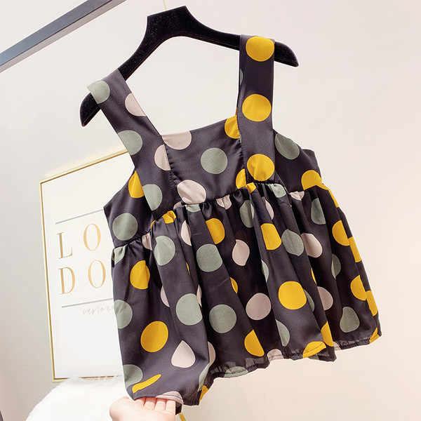 Pöttyös, pántos női felső