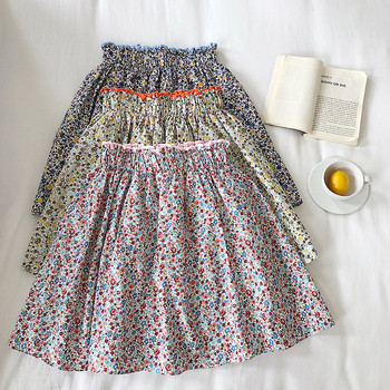 Női alkalmi szoknya elasztikus derékkal, virágmintával