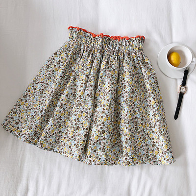 Női alkalmi szoknya elasztikus derékkal, virágmintával