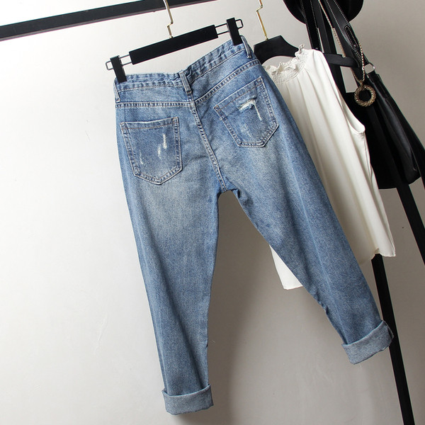 Blugi moderni de dama cu motive rupte in albastru