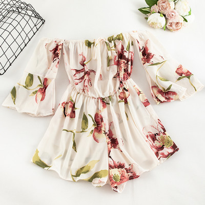 Salopetă de damă modernă cu mâneci căzute și motive florale în mai multe culori