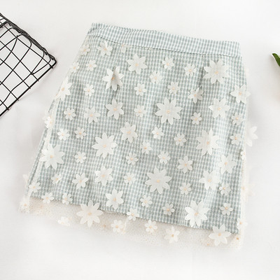 Kockás női szoknya virágmotívumokkal három színben