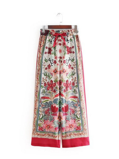 Pantaloni largi de dama roz cu model floral