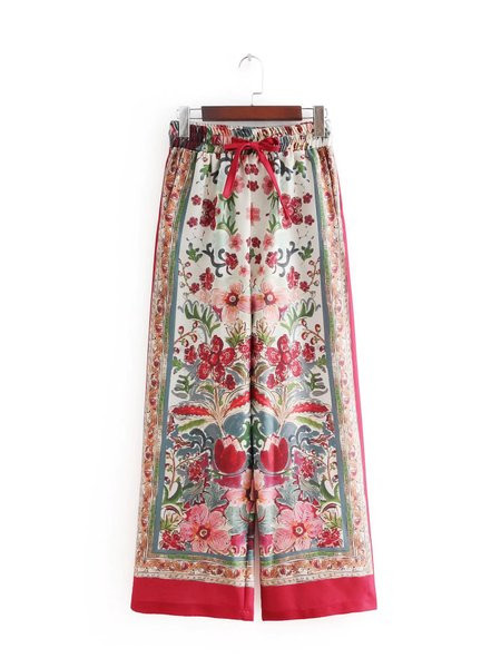 Pantaloni largi de dama roz cu model floral