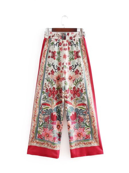 Pantaloni largi de dama roz cu model floral