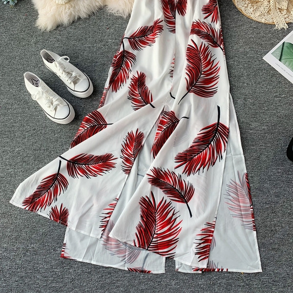 Modern női hosszú ruha hasítékkal, vékony pántokkal