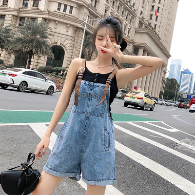 Γυναικεία ολόσωμη φόρμα denim σε ανοιχτό χρώμα