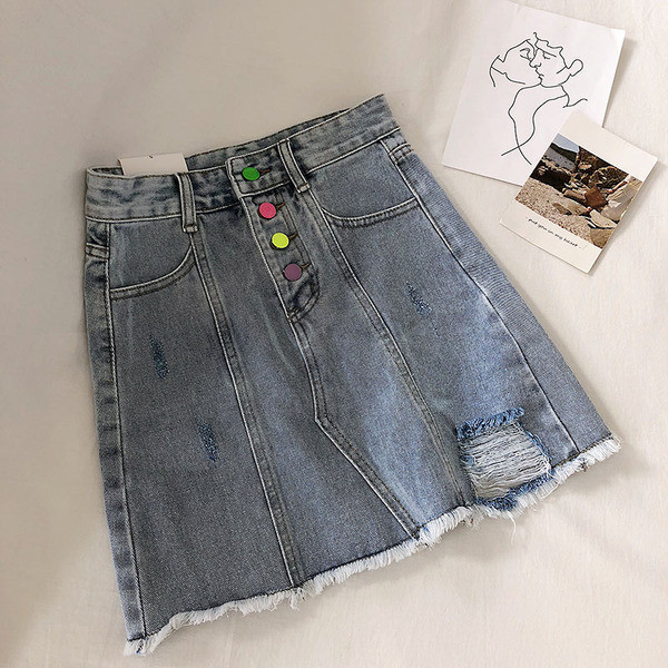 Női farmerszoknya színes gombokkal