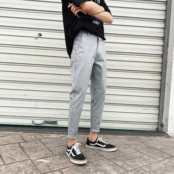 Férfi nadrág Karcsú modell szürke és fekete zsebekkel
