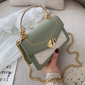 Stílusos női táska hosszú és rövid fém fogantyúval