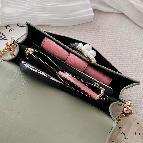 Stílusos női táska hosszú és rövid fém fogantyúval