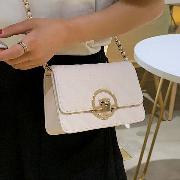 Geanta de dama moderna cu inchidere metalica in patru culori