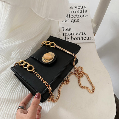 Elegáns női táska fém rögzítéssel több színben