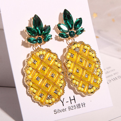 Modern női fülbevaló sárga kövekkel