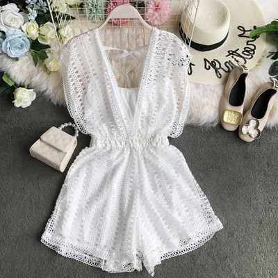 Κομψές γυναικείες ολόσωμες φόρμες με V-λαιμό σε μαύρο και άσπρο χρώμα