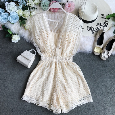 Κομψές γυναικείες ολόσωμες φόρμες με V-λαιμό σε μαύρο και άσπρο χρώμα