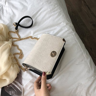 Eko bőrből készült stílusos női táska fém díszítéssel