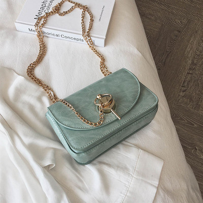 Geanta de dama moderna din piele ecologica cu elemente metalice