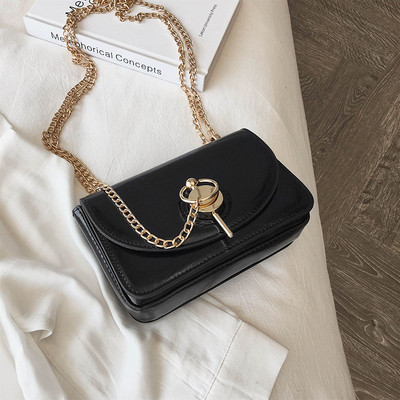 Geanta de dama moderna din piele ecologica cu elemente metalice