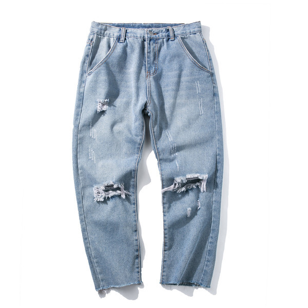 Modern, világos színű férfi farmer, szakadt motívumokkal