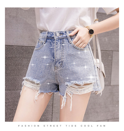 Pantaloni scurți de damă din denim cu motive rupte de culoare deschisă