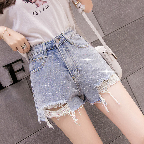 Pantaloni scurți de damă din denim cu motive rupte de culoare deschisă