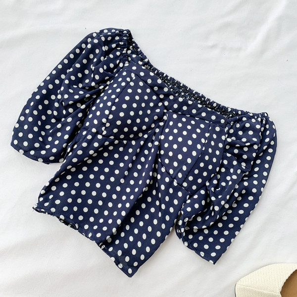 Bluză de damă cu buline în albastru și alb