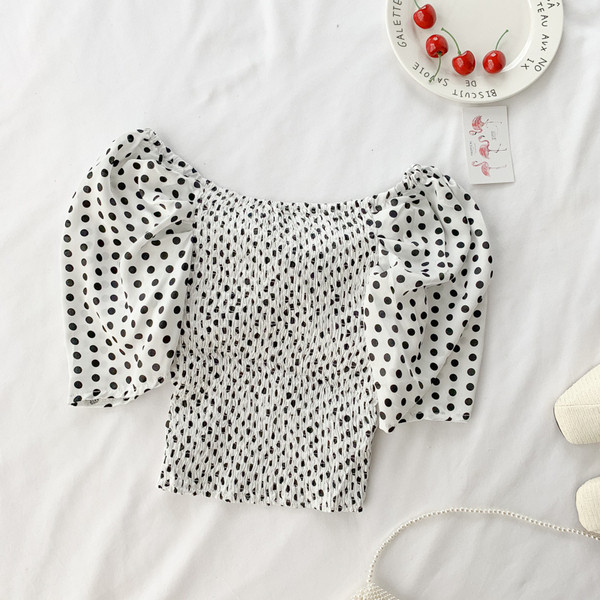 Bluză de damă cu buline în albastru și alb