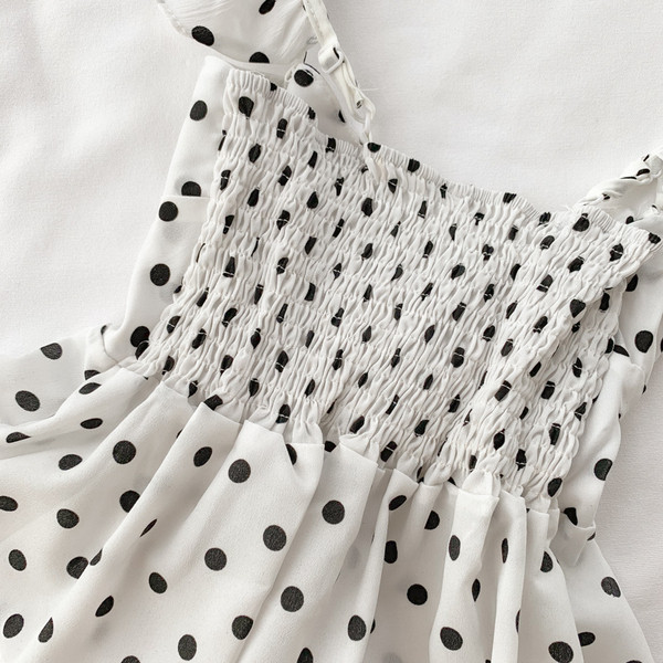 Női felső, fehér pöttyökkel