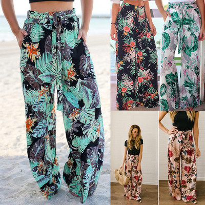 Women`s summer wide pants with a floral motif