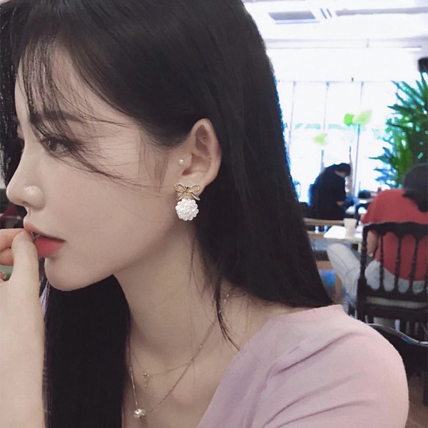 Elegáns női fülbevaló kerek forma gyöngyökkel