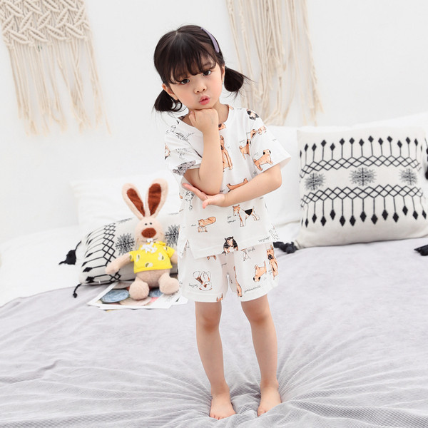 Pijamale pentru copii în două părți în alb pentru fete