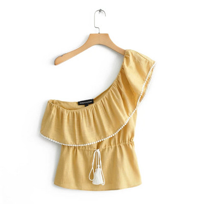 Női felső egy váll- és derékkötővel